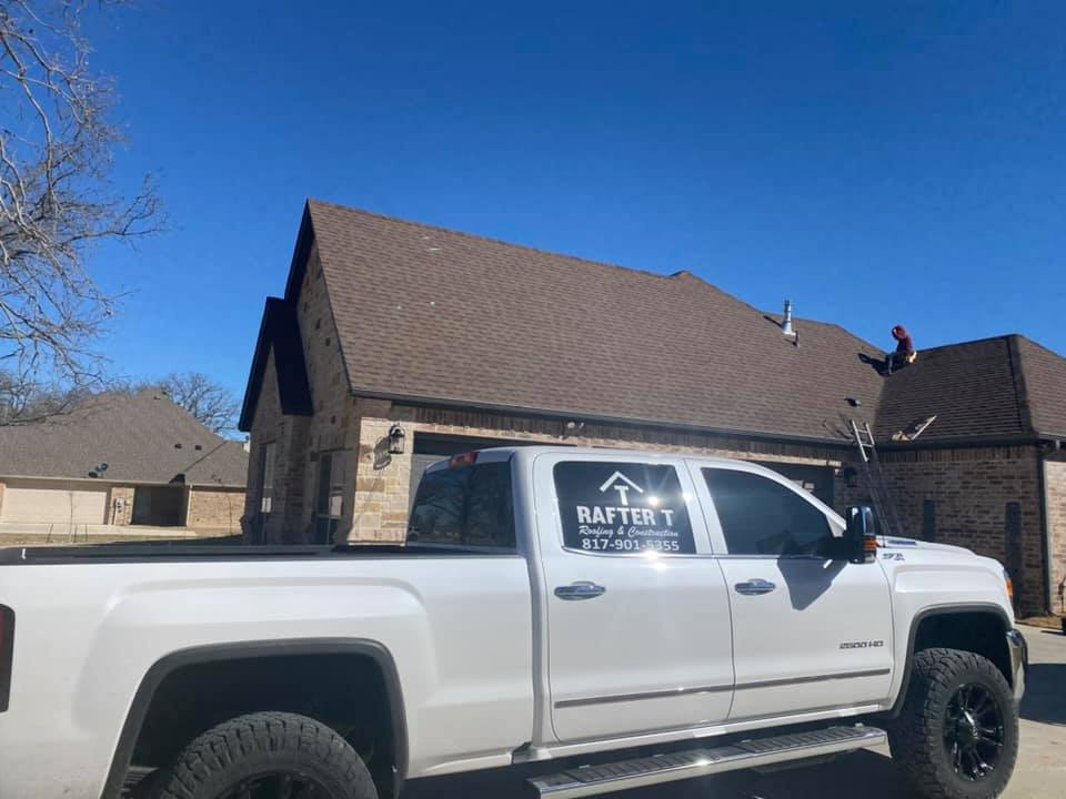 Rafter T branded truck on a residential roofing job in Weatherford